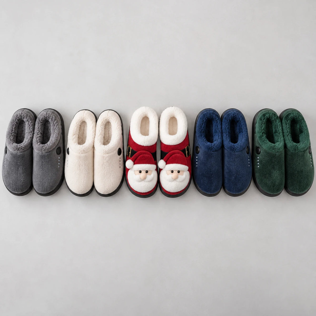 Toastie heated slippers lined up in grey, cream, Santa red, navy and green