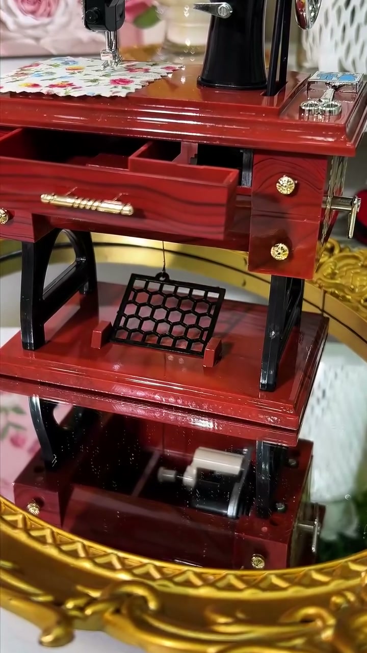 Side view of the sewing machine music box