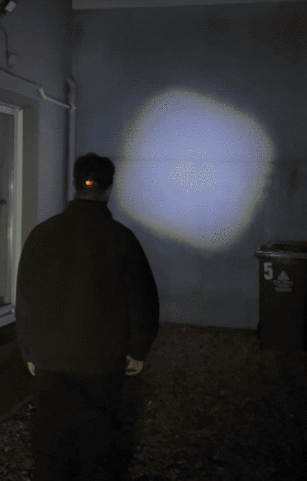 A regular headlamp lighting a single spot