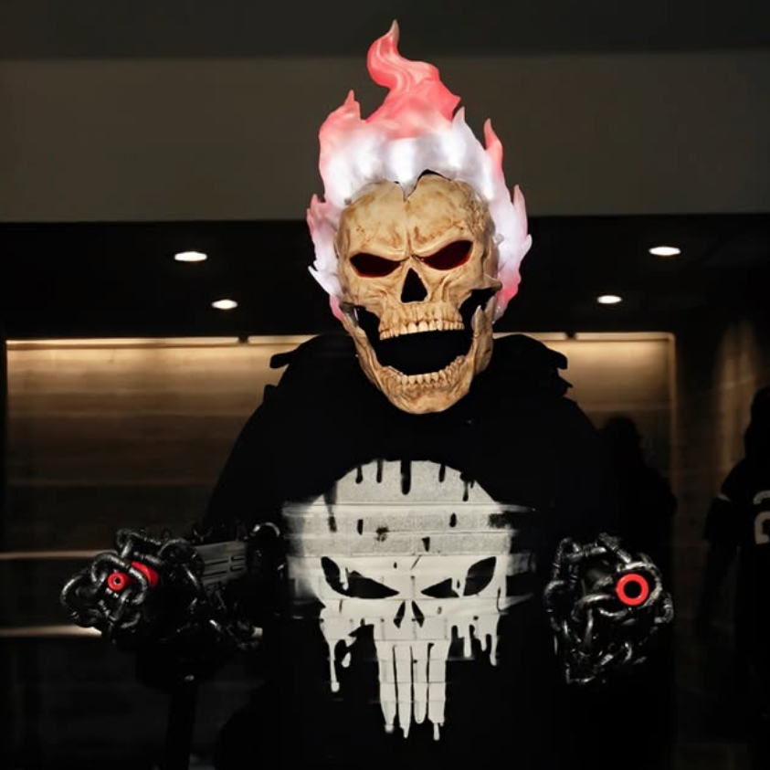 Inferno Reaper mask with white flames lit in a dark room