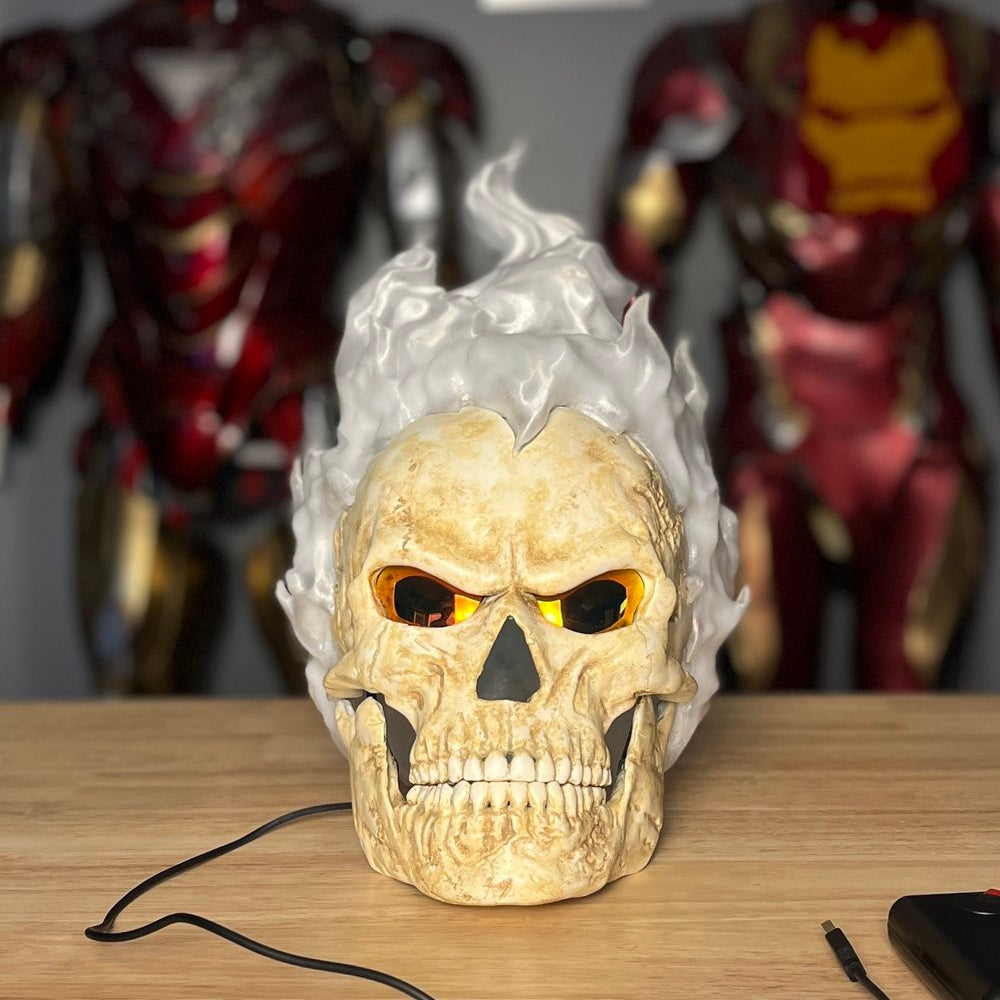 Inferno Reaper mask on a table with the lights off