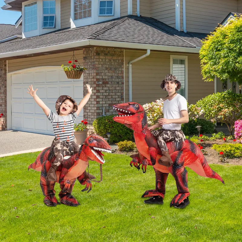 Parent and child riding red Raptie dinosaur costumes