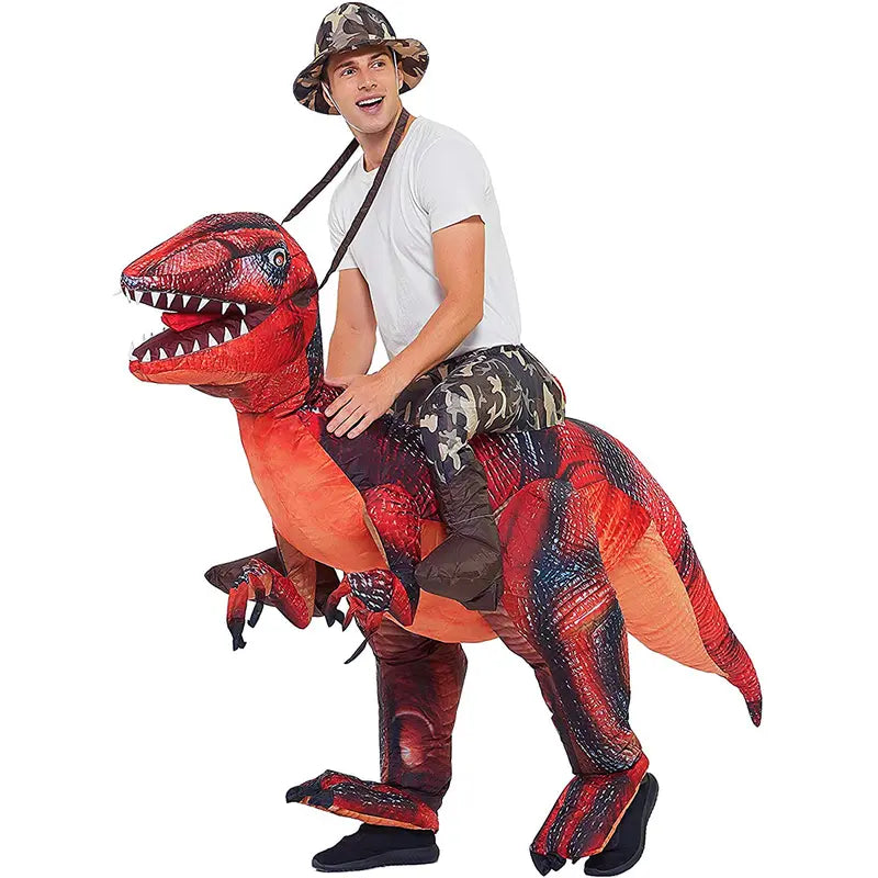 Adult riding a red Raptie dinosaur costume