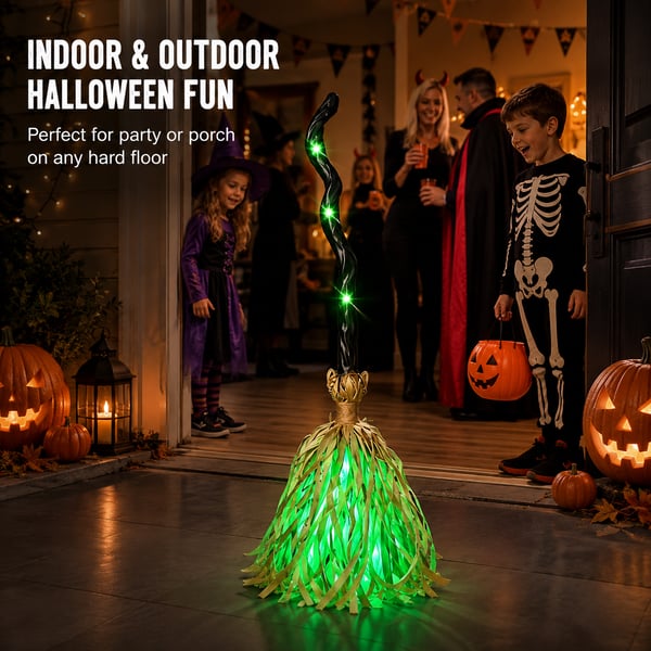 Swishy witch broom glowing at the front door with trick-or-treaters