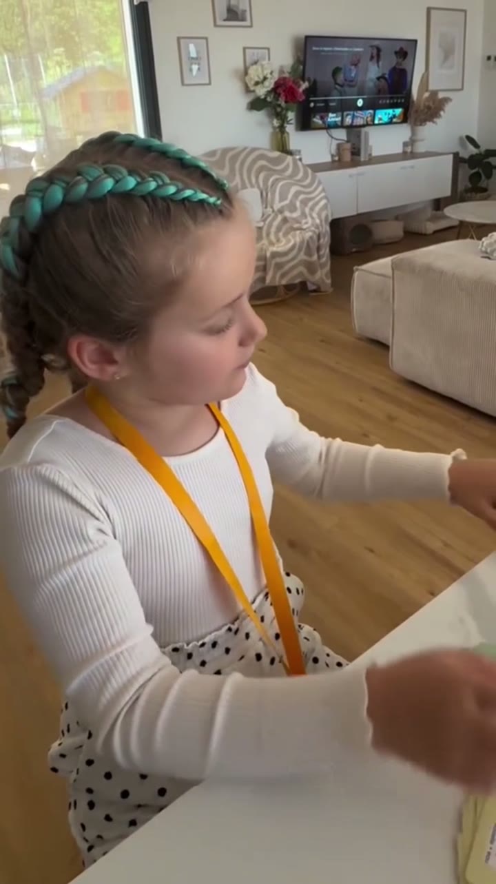 A girl exploring with her microscope